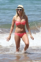 Ashley Tisdale - Bikini on the beach in Hawaii March 19, 2012