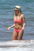 Ashley Tisdale - Bikini on the beach in Hawaii March 19, 2012